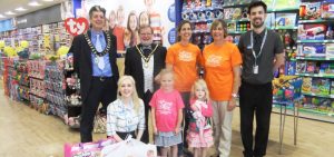 Cllr Harrison and staff at the Entertainer